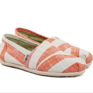 TOMS orange white striped slip on